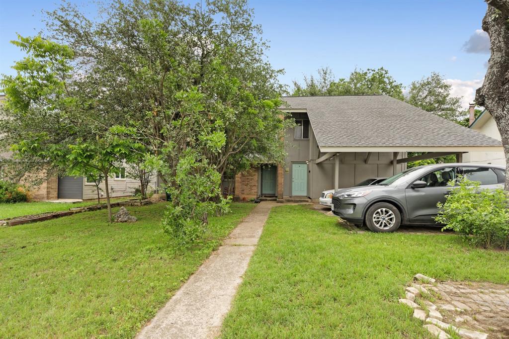 View 6901 Woodhue Dr in Timber Village Amd 6901 Woodhue Dr - front exterior - Luxury home in Timber Village Amd, Austin, TX