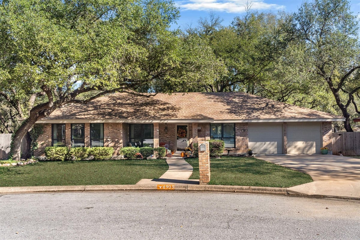 View 6903 Treaty Oak CIR in Smiths J W Western Oaks 1A 6903 Treaty Oak CIR - property photo 1 - Luxury home in Smiths J W Western Oaks 1A, Austin, TX