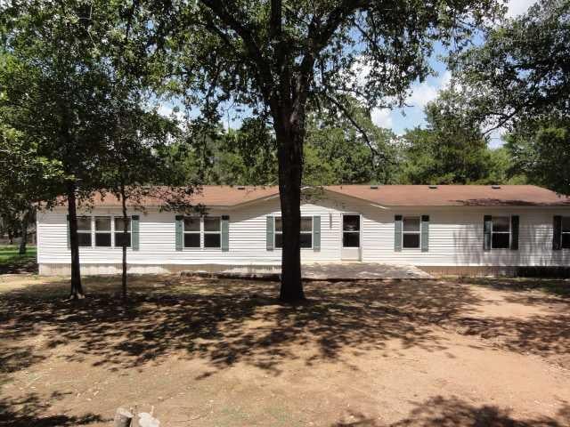 View 695 Country WAY 695 Country WAY - front exterior - Luxury home in Smithville, TX