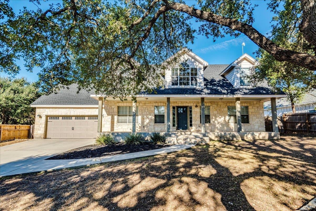 View 7 Cripple Creek Ct in Woodcreek Sec 12 7 Cripple Creek Ct - front exterior - Luxury home in Woodcreek Sec 12, Wimberley, TX
