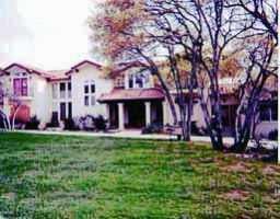 View 7 Old Stable Ln in SEVEN OAKS SUBD 7 Old Stable Ln - front exterior - Luxury home in SEVEN OAKS SUBD, Austin, TX