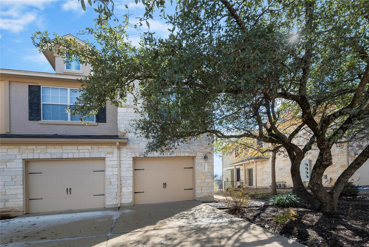 View 700 Mandarin Flyway Unit #2101 in Silver Oak Twnhms 700 Mandarin Flyway Unit #2101 - property photo 1 - Luxury home in Silver Oak Twnhms, Cedar Park, TX