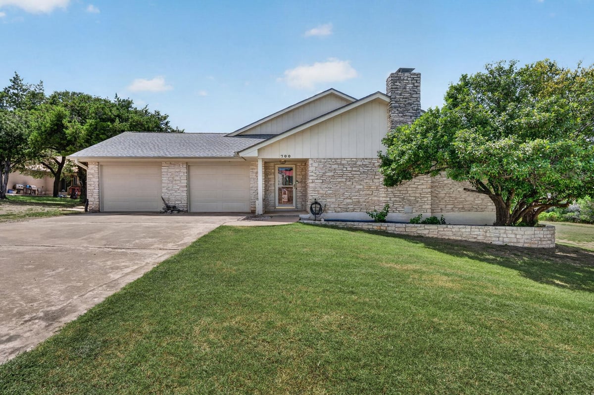 View 700 Rogart DR in Briarcliff Inc Sec 15 700 Rogart DR - front exterior - Luxury home in Briarcliff Inc Sec 15, Spicewood, TX