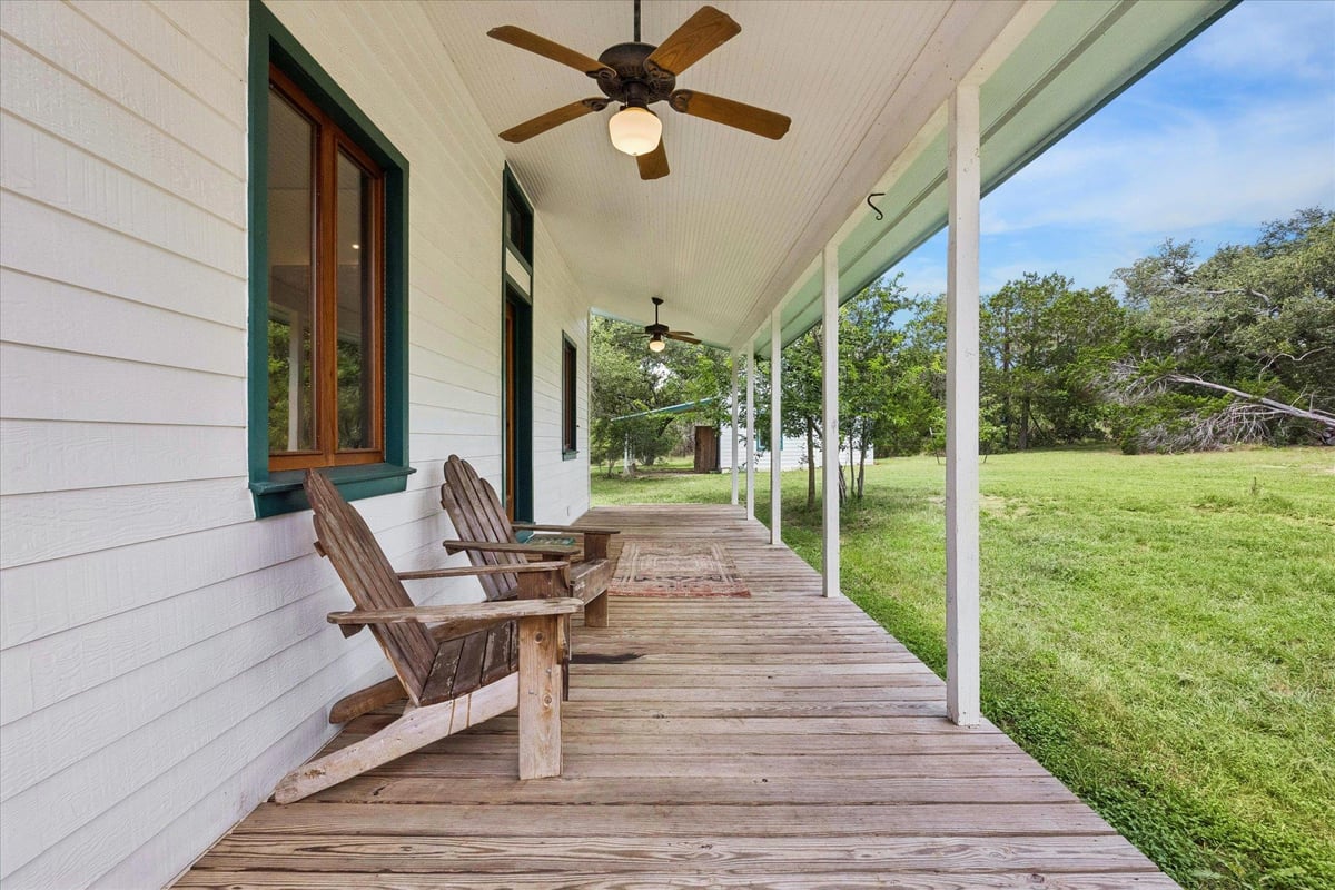 View 700 S Rainbow Ranch RD in Rainbow Ranch 700 S Rainbow Ranch RD - front exterior - Luxury home in Rainbow Ranch, Wimberley, TX