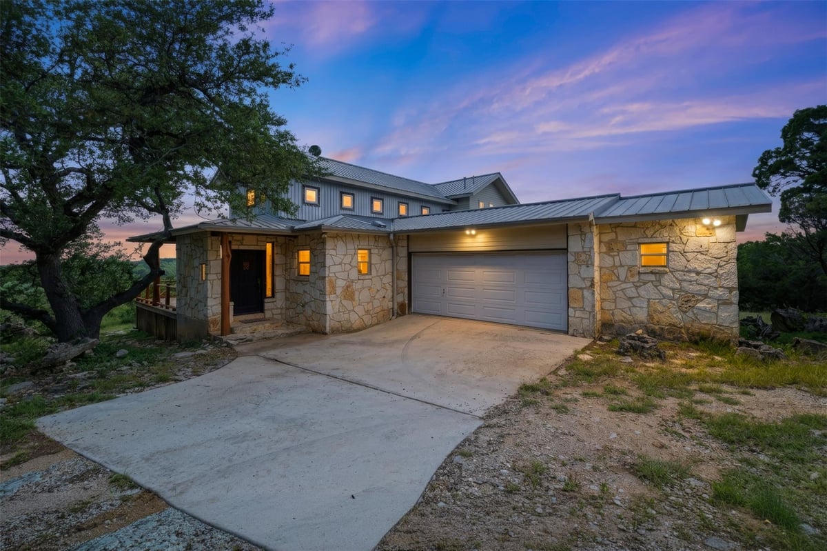 View 700 Skyline Ridge Lookout DR in Skyline Ranch Estates 700 Skyline Ridge Lookout DR - front exterior - Luxury home in Skyline Ranch Estates, Wimberley, TX