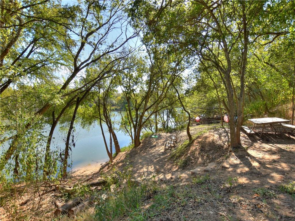View 7000 Bay City BND in Knollwood On The Colorado River 7000 Bay City BND - front exterior - Luxury home in Knollwood On The Colorado River, Austin, TX