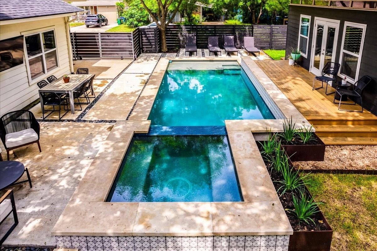 View 7000 St. Johns Cir in Lamar Village-Crestview 7000 St. Johns Cir - front exterior - Luxury home in Lamar Village-Crestview, Austin, TX