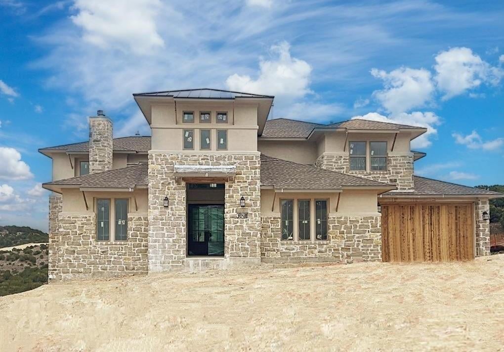 View 7001 Davenport Divide Rd in Sweetwater 7001 Davenport Divide Rd - front exterior - Luxury home in Sweetwater, Austin, TX