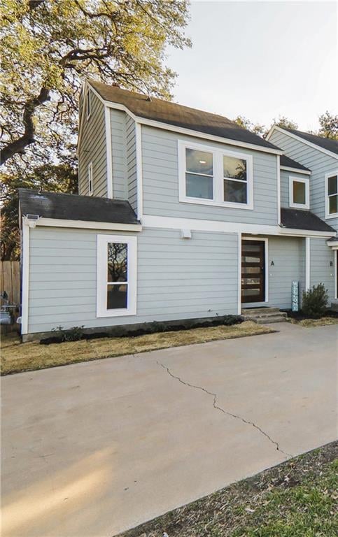 View 7001 Woodhue Dr Unit #A in Wyldwood Sec 01 7001 Woodhue Dr Unit #A - front exterior - Luxury home in Wyldwood Sec 01, Austin, TX