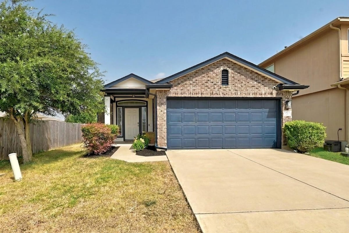 View 7004 Heine Farm RD Unit #2 in Stoney Ridge Ph B Sec 02 7004 Heine Farm RD Unit #2 - front exterior - Luxury home in Stoney Ridge Ph B Sec 02, Del Valle, TX