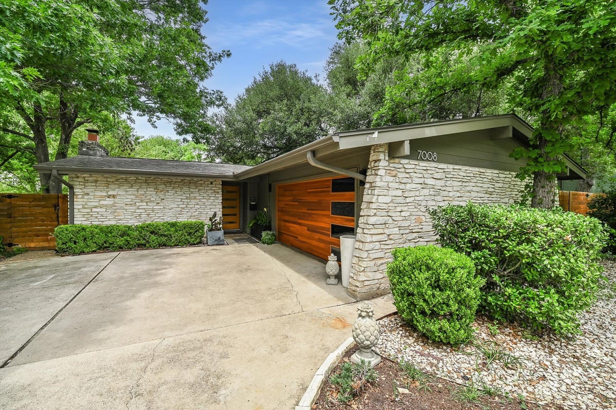 View 7008 E Shoal Creek Blvd in Allandale Terrace Sec 03 7008 E Shoal Creek Blvd - front exterior - Luxury home in Allandale Terrace Sec 03, Austin, TX