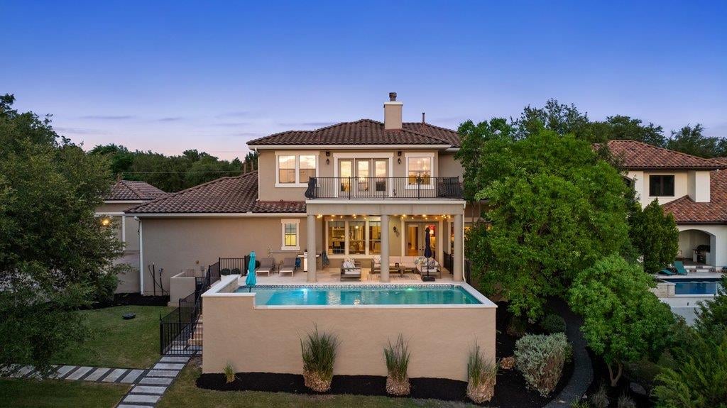 View 701 Hurst Creek RD in Coves At Lakeway 701 Hurst Creek RD - front exterior - Luxury home in Coves At Lakeway, Lakeway, TX