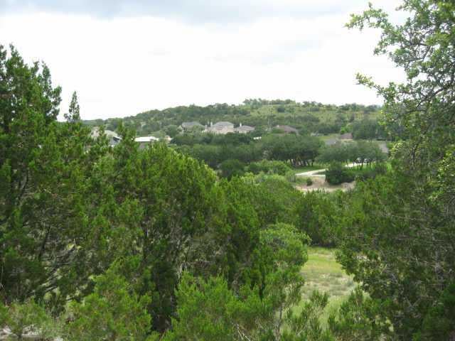 View 701 Newport DR 701 Newport DR - front exterior - Luxury lot in Briarcliff, TX