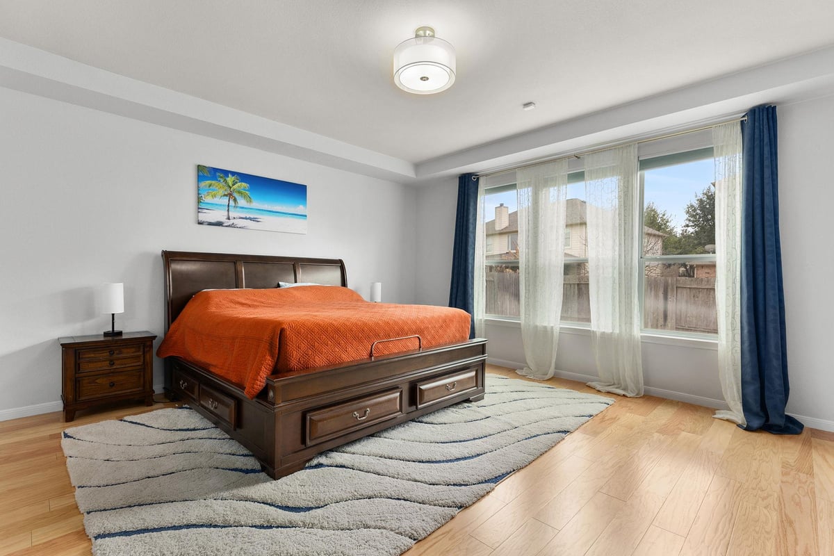 Primary bedroom at 701 Old Ravine Ct - 5 bed 3 bath home