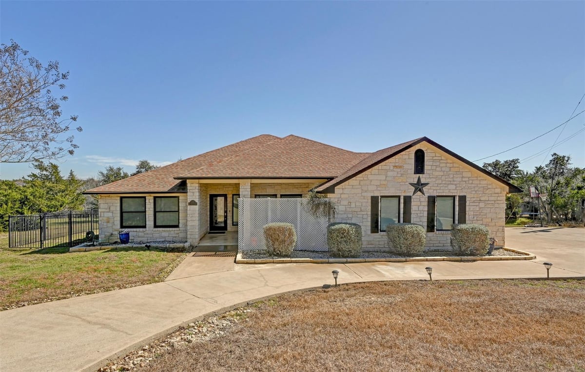 View 701 W Creek Dr in Sunset Canyon Sec 4 701 W Creek Dr - property photo 1 - Luxury home in Sunset Canyon Sec 4, Dripping Springs, TX
