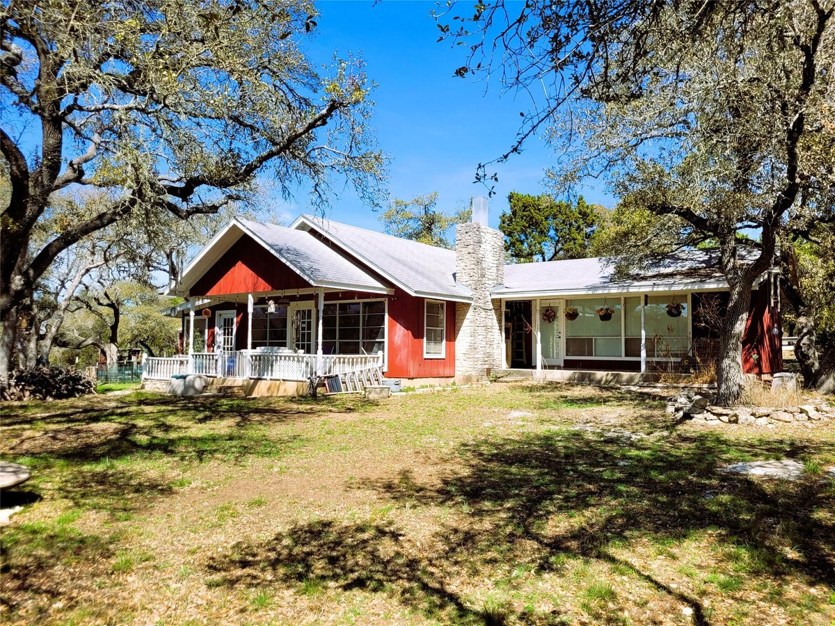 View 702 Cottonwood Creek RD in Sunset Canyon Sec 4 702 Cottonwood Creek RD - front exterior - Luxury home in Sunset Canyon Sec 4, Dripping Springs, TX