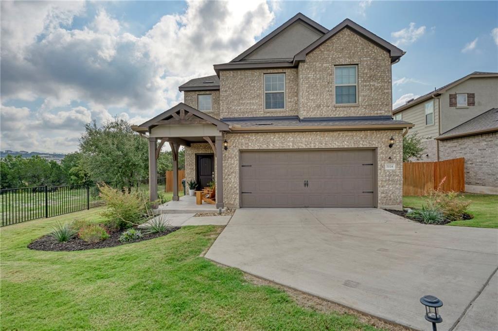 7024 Llano Stage TRL - front exterior - Luxury home in Sweetwater Ranch Sec 2 Village P3B, Austin, TX