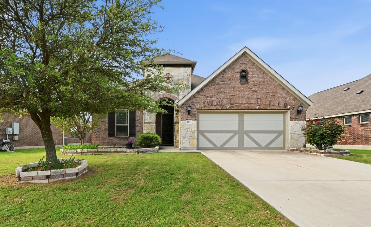 View 703 N Emory Cv in EMORY FARMS 703 N Emory Cv - front exterior - Luxury home in EMORY FARMS, Hutto, TX