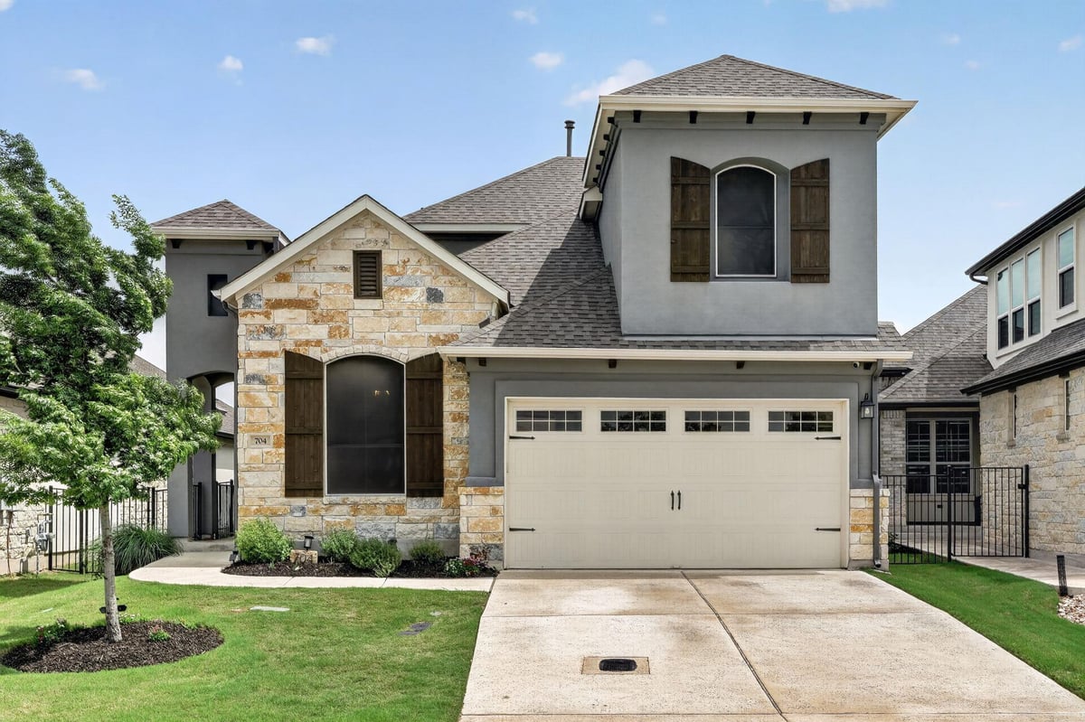 View 704 Faith Dr in Santa Rita Ranch Ph 1 Sec 9 704 Faith Dr - front exterior - Luxury home in Santa Rita Ranch Ph 1 Sec 9, Liberty Hill, TX