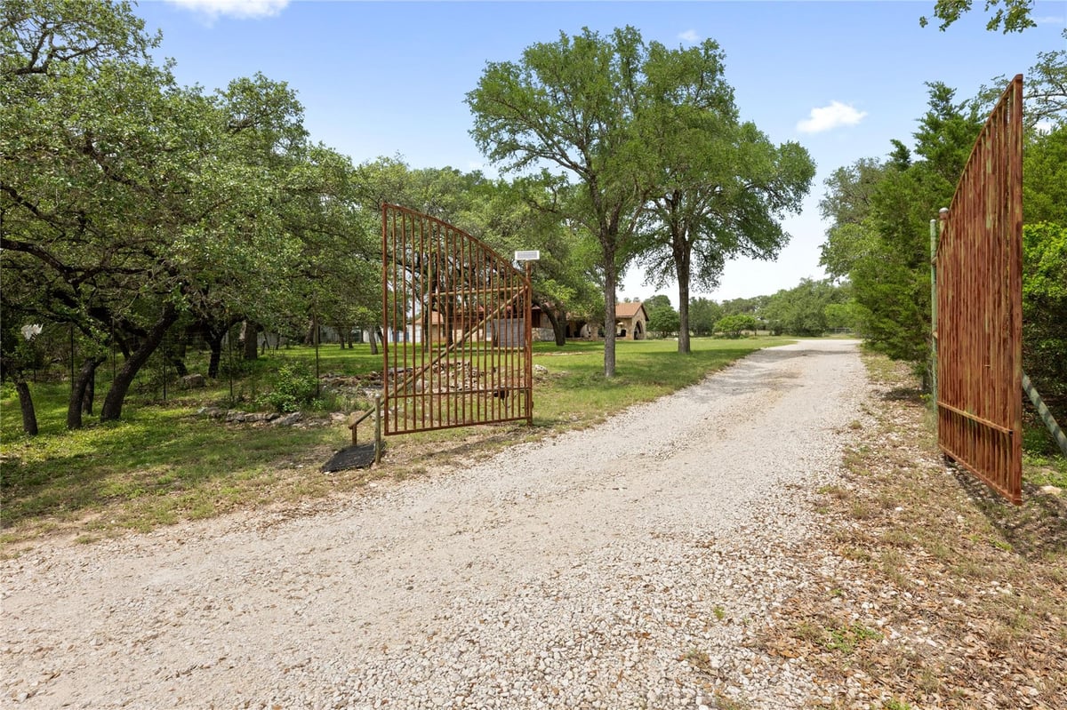 View 704 Fm 2325 in Madrone Park 704 Fm 2325 - front exterior - Luxury home in Madrone Park, Wimberley, TX