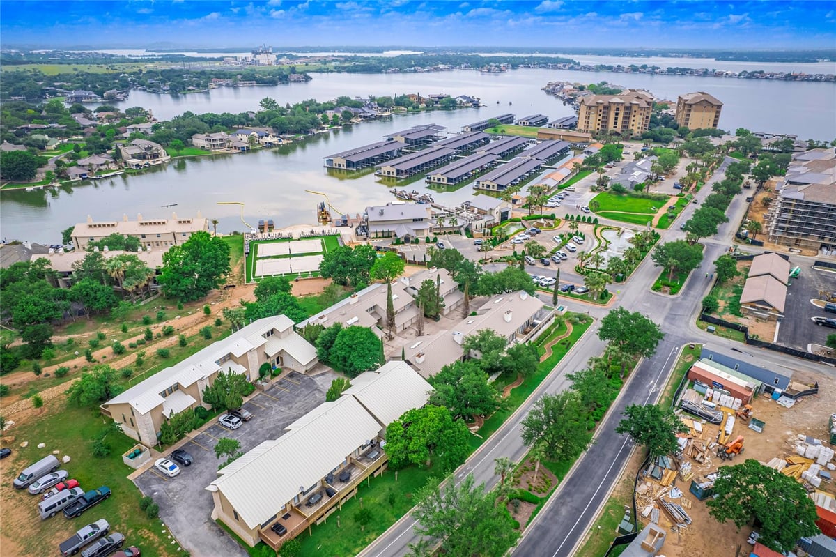 View 704 Horseshoe Bay Blvd Unit #L in Tall Timbers 704 Horseshoe Bay Blvd Unit #L - front exterior - Luxury home in Tall Timbers, Horseshoe Bay, TX