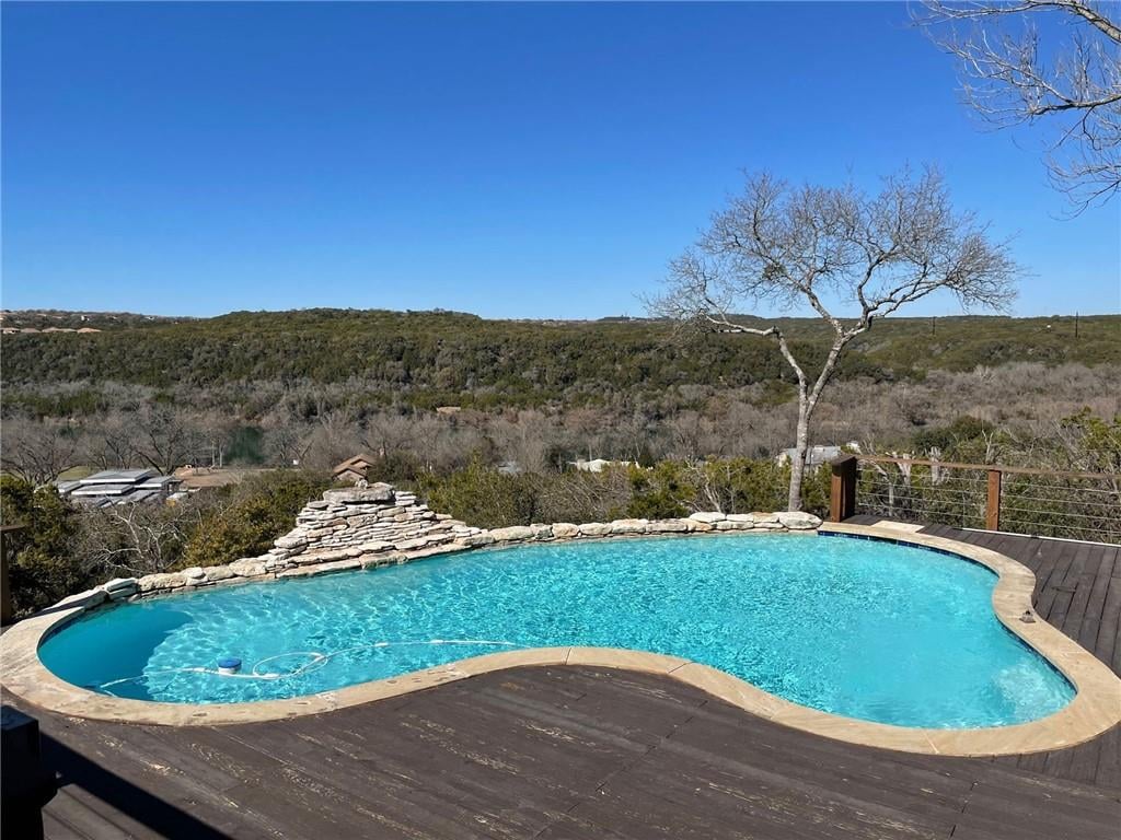 704 N Commons Ford RD - property photo 1 - Luxury home in Bruton Spgs, Austin, TX