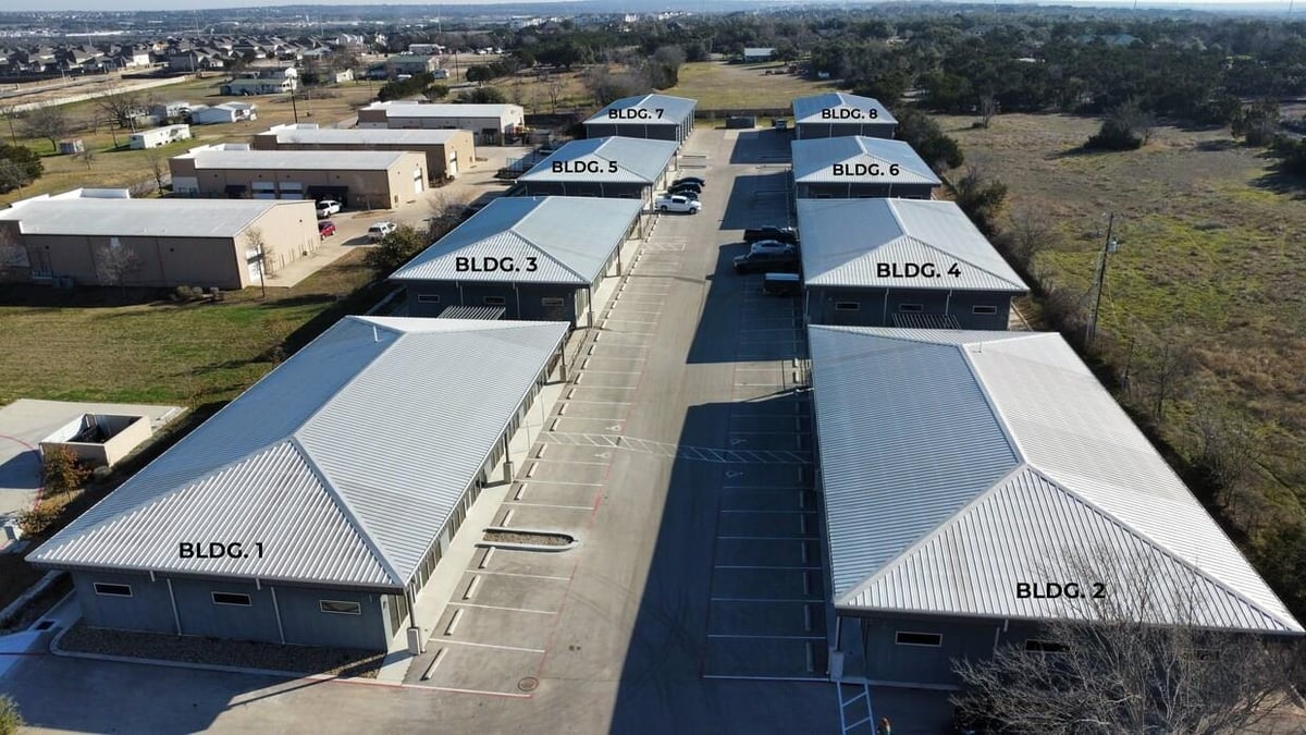 View 706 Leander Dr in Leander Heights Sec 03 706 Leander Dr - aerial view with commercial warehouse aerial - Luxury home in Leander Heights Sec 03, Leander, TX