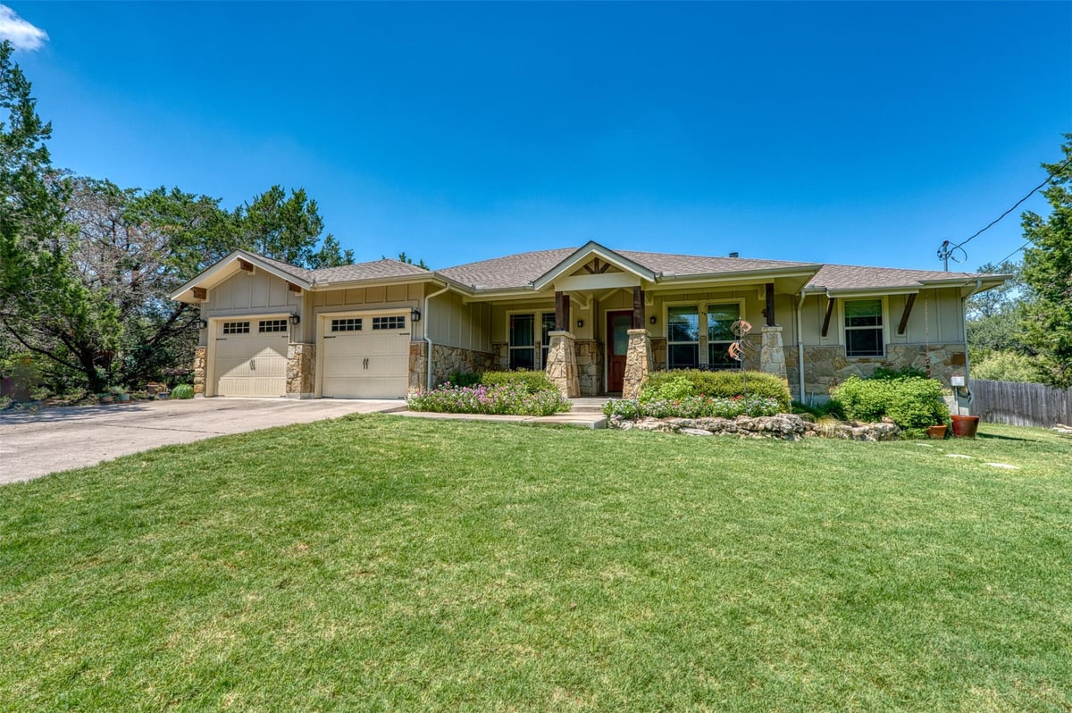 View 706 Rogart Dr in Briarcliff Inc Sec 15 706 Rogart Dr - front exterior - Luxury home in Briarcliff Inc Sec 15, Spicewood, TX