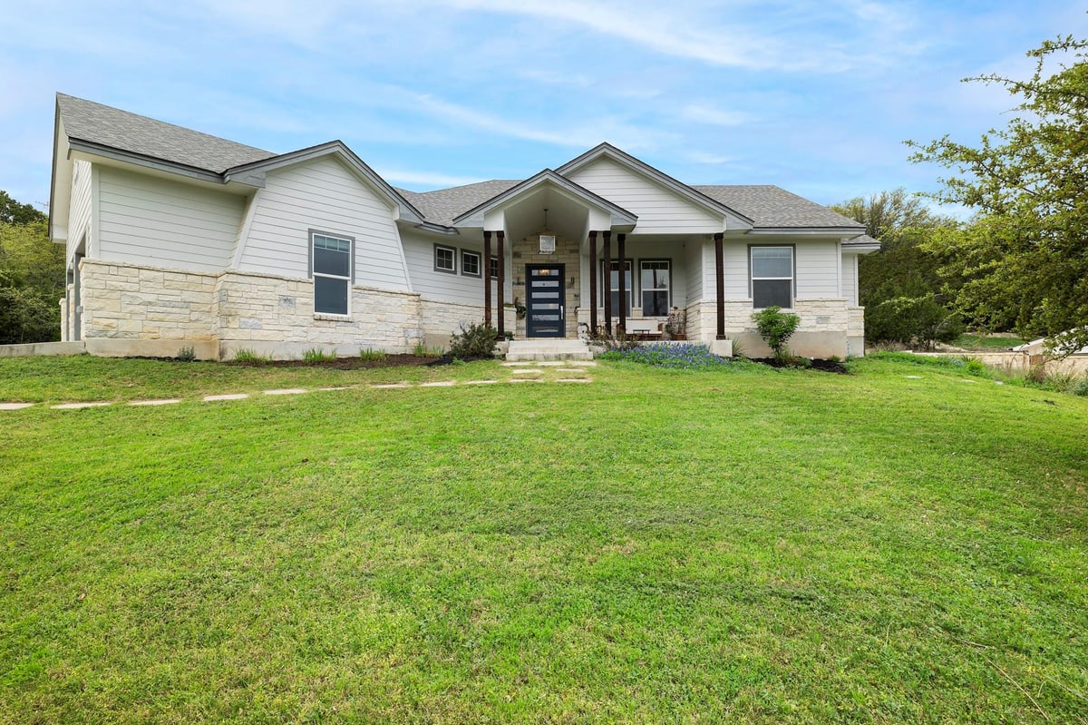 View 706 Stow DR in Briarcliff Inc Sec 10 706 Stow DR - front exterior - Luxury home in Briarcliff Inc Sec 10, Spicewood, TX