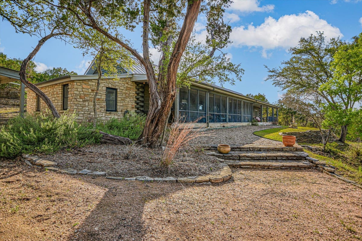 View 707 Deer Lake Rd in Commanche Waters 707 Deer Lake Rd - front exterior - Luxury home in Commanche Waters, Wimberley, TX