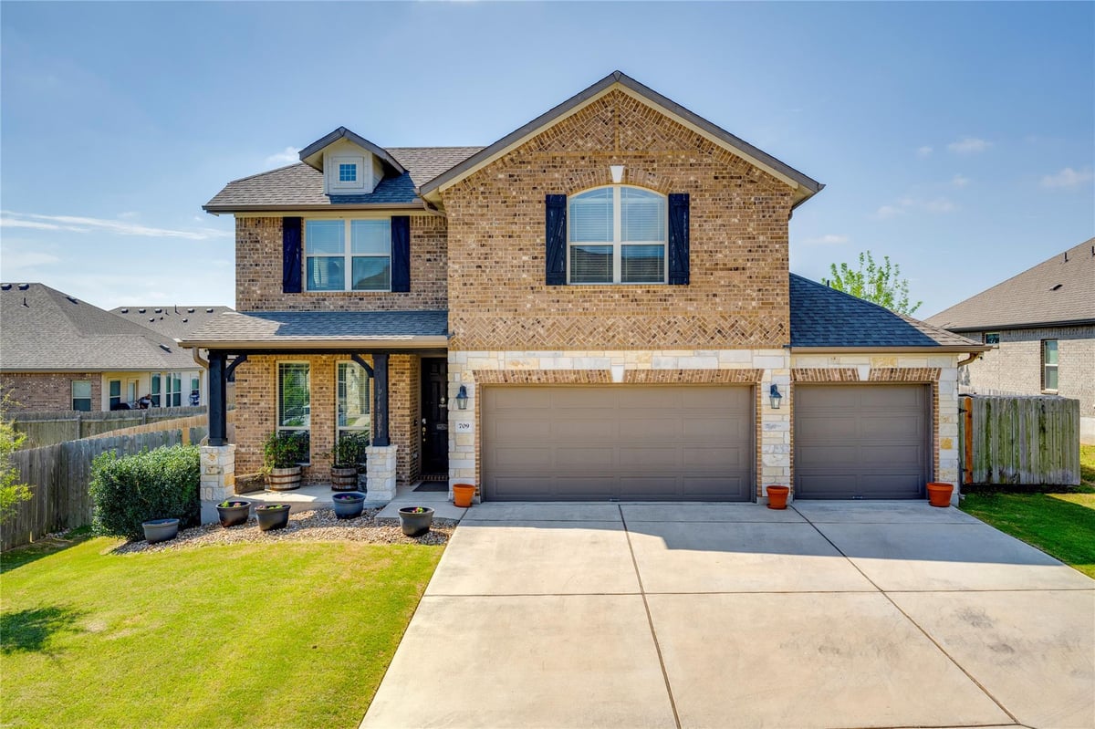 View 709 Tinton Falls Ln in Reserve at Penley Park 709 Tinton Falls Ln - front exterior - Luxury home in Reserve at Penley Park, Pflugerville, TX