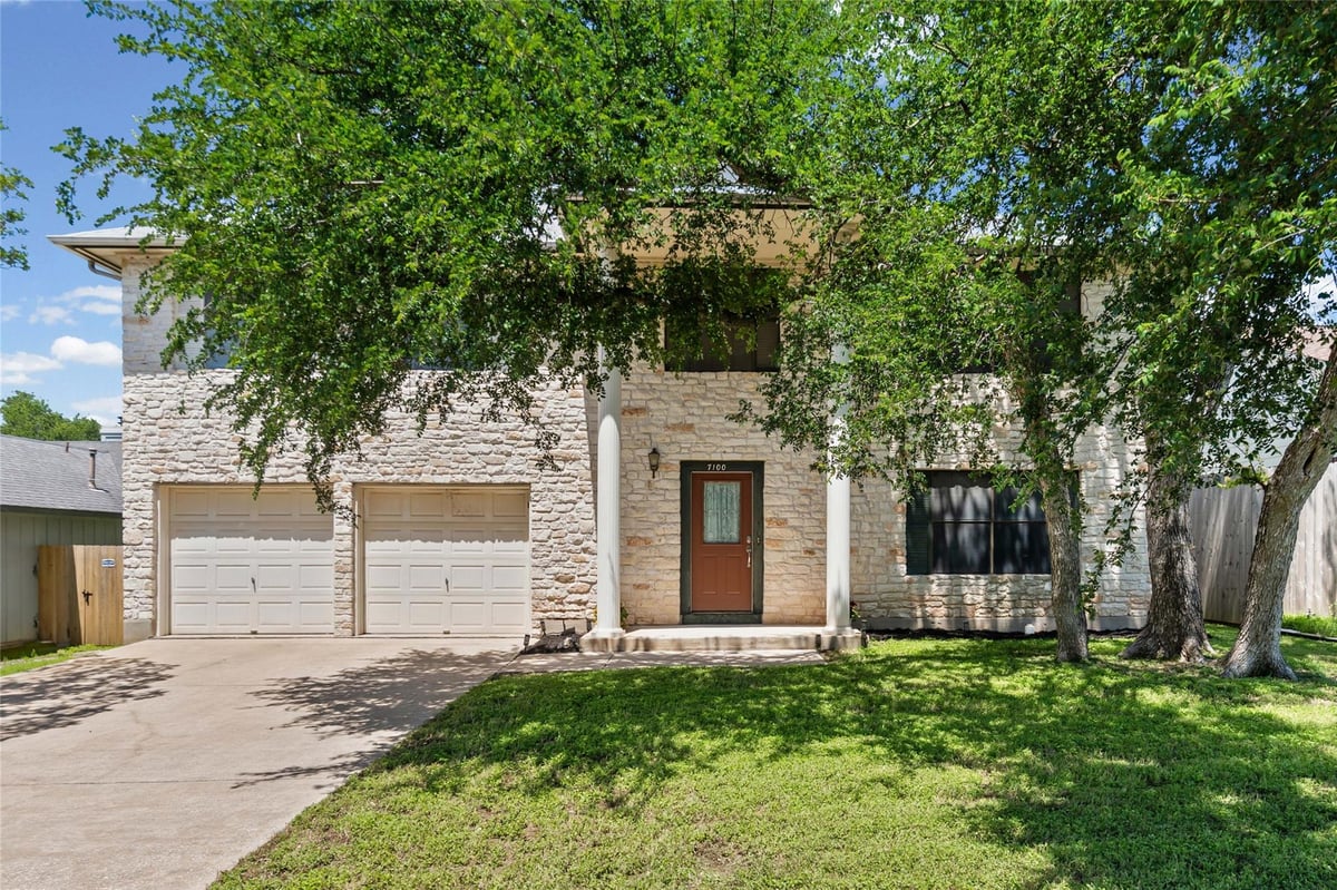 View 7100 Pine Bluffs TRL in Milwood Sec 26A 7100 Pine Bluffs TRL - front exterior - Luxury home in Milwood Sec 26A, Austin, TX