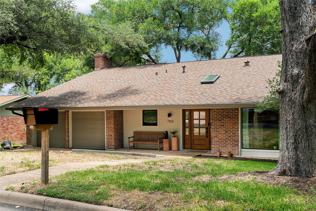 View 7103 Creighton LN in University Hills West 7103 Creighton LN - property photo 1 - Luxury home in University Hills West, Austin, TX