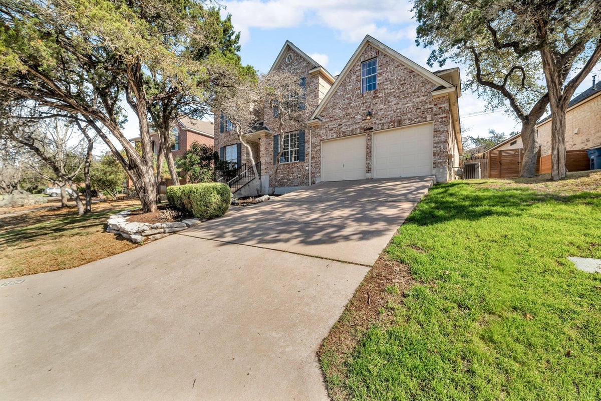 View 7104 Rain Creek Pkwy in Great Hills Ph 02 Sec 02 7104 Rain Creek Pkwy - front exterior - Luxury home in Great Hills Ph 02 Sec 02, Austin, TX
