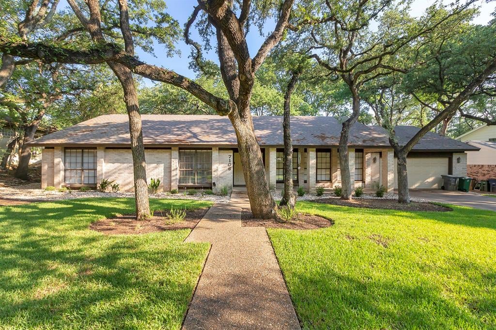 View 7106 Montana Norte in Highland Hills Northwest Sec 6 7106 Montana Norte - property photo 1 - Luxury home in Highland Hills Northwest Sec 6, Austin, TX
