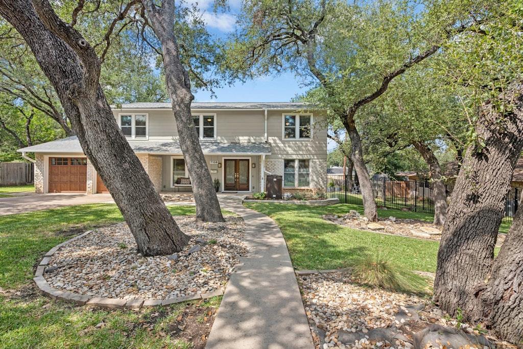 View 7106 Sungate DR in Highland Hills Northwest Sec 3 7106 Sungate DR - front exterior - Luxury home in Highland Hills Northwest Sec 3, Austin, TX
