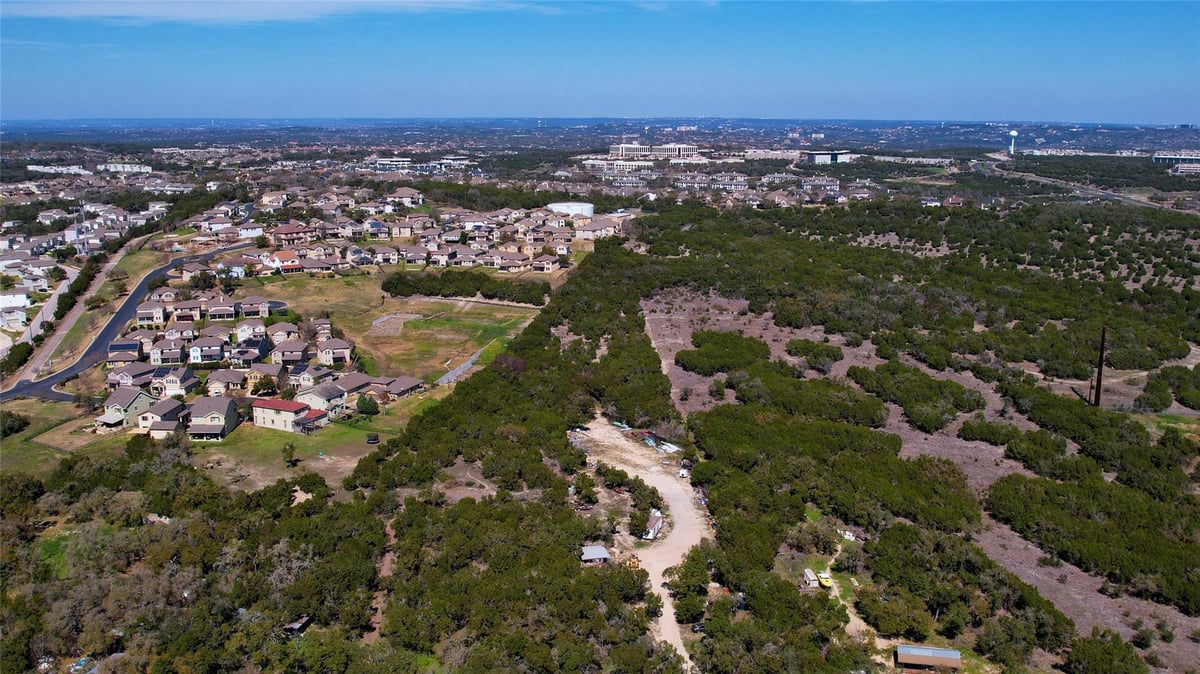 View 7110 Old Bee Caves Rd in Anderson T 7110 Old Bee Caves Rd - front exterior - Luxury home in Anderson T, Austin, TX