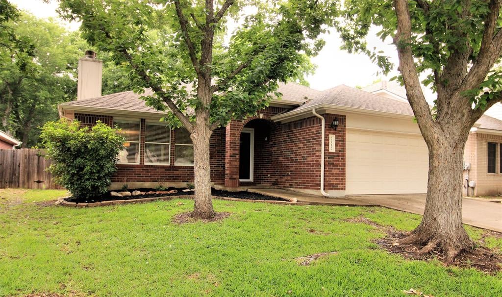 View 7112 Quimper Ln in Legend Oaks Sec 07 7112 Quimper Ln - front exterior - Luxury home in Legend Oaks Sec 07, Austin, TX
