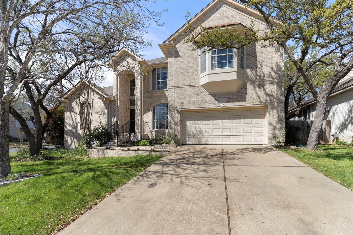 View 7124 Gentle Oak Dr in Woods Legend Oaks Sec 01 7124 Gentle Oak Dr - front exterior - Luxury home in Woods Legend Oaks Sec 01, Austin, TX