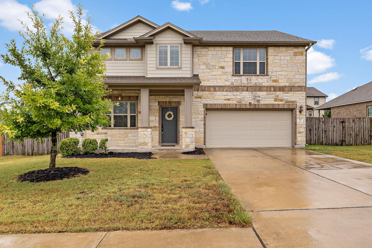 View 713 Carillion DR in Penley Park Ph 1 713 Carillion DR - front exterior - Luxury home in Penley Park Ph 1, Pflugerville, TX