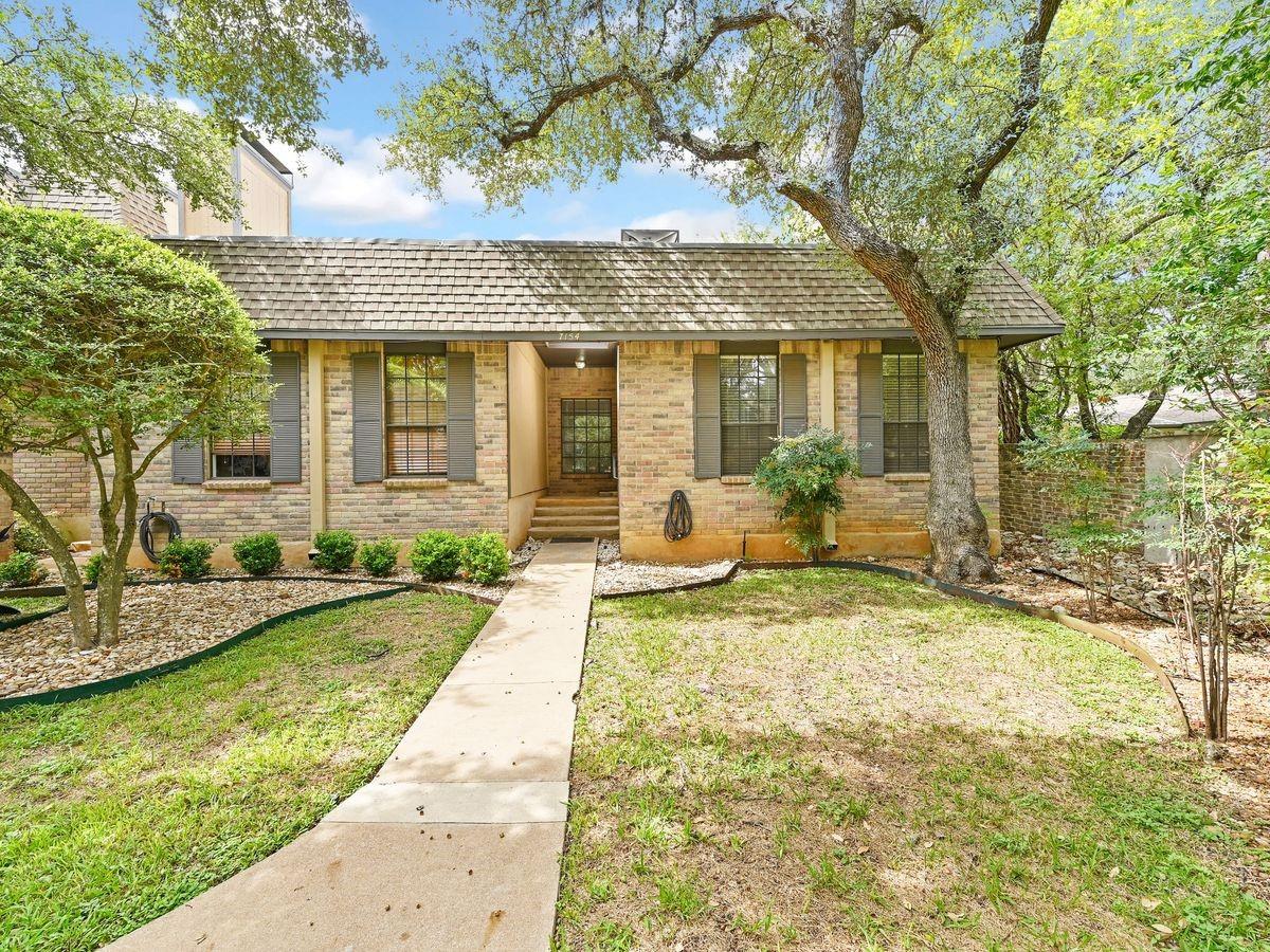 7154 Chimney Cors Unit #A - front exterior - Luxury home in Chimney Corners Twnhs, Austin, TX