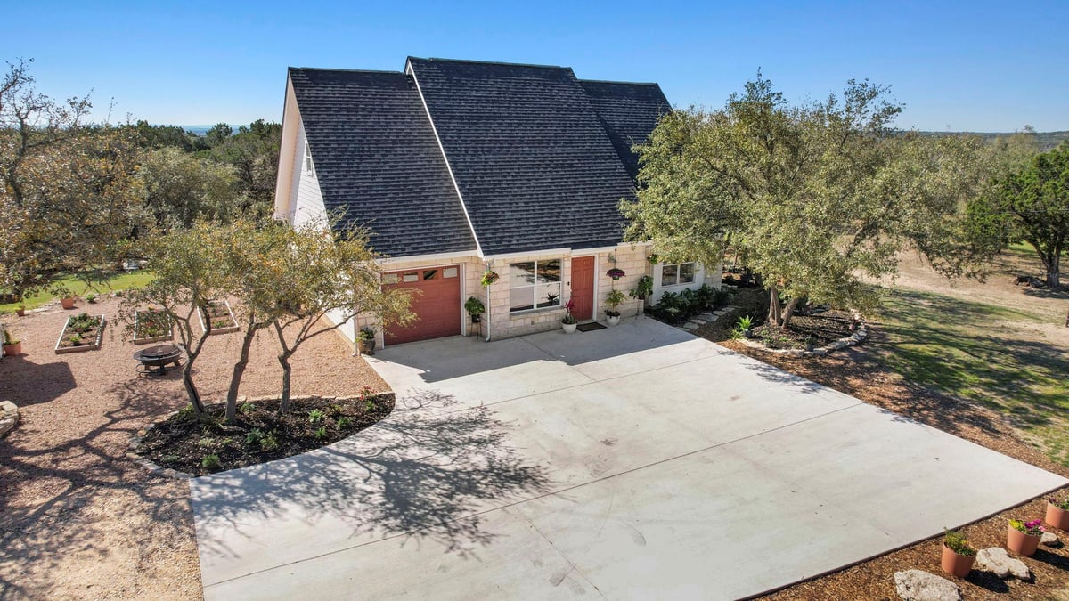 View 7197 Mount Sharp Rd in Mount Sharp Ranch 7197 Mount Sharp Rd - property photo 1 - Luxury home in Mount Sharp Ranch, Wimberley, TX