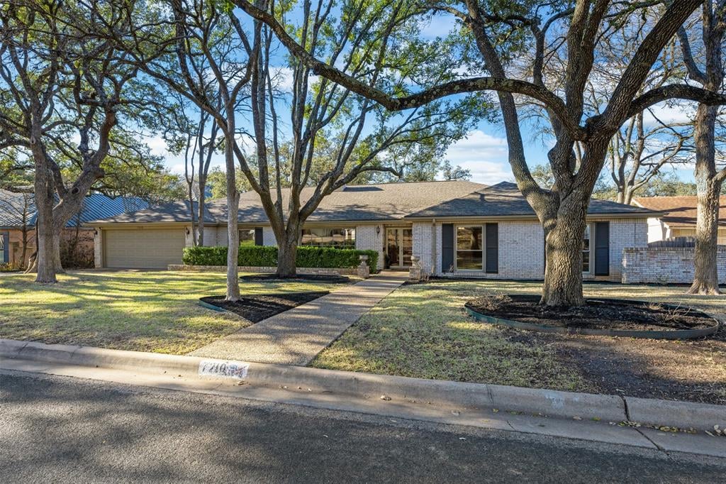 View 7210 W Rim DR in Northwest Hills Sec 07 7210 W Rim DR - front exterior - Luxury home in Northwest Hills Sec 07, Austin, TX