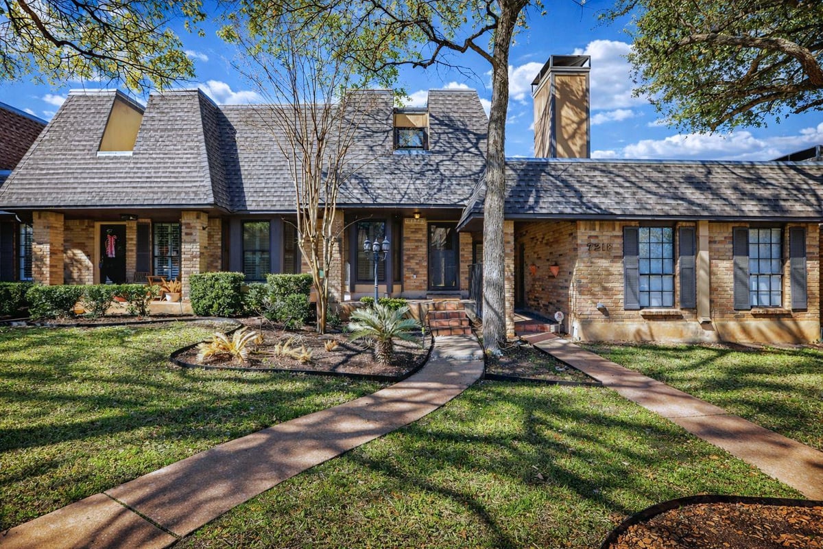 View 7216 Chimney Cors in Chimney Corners Twnhs 7216 Chimney Cors - front exterior - Luxury home in Chimney Corners Twnhs, Austin, TX