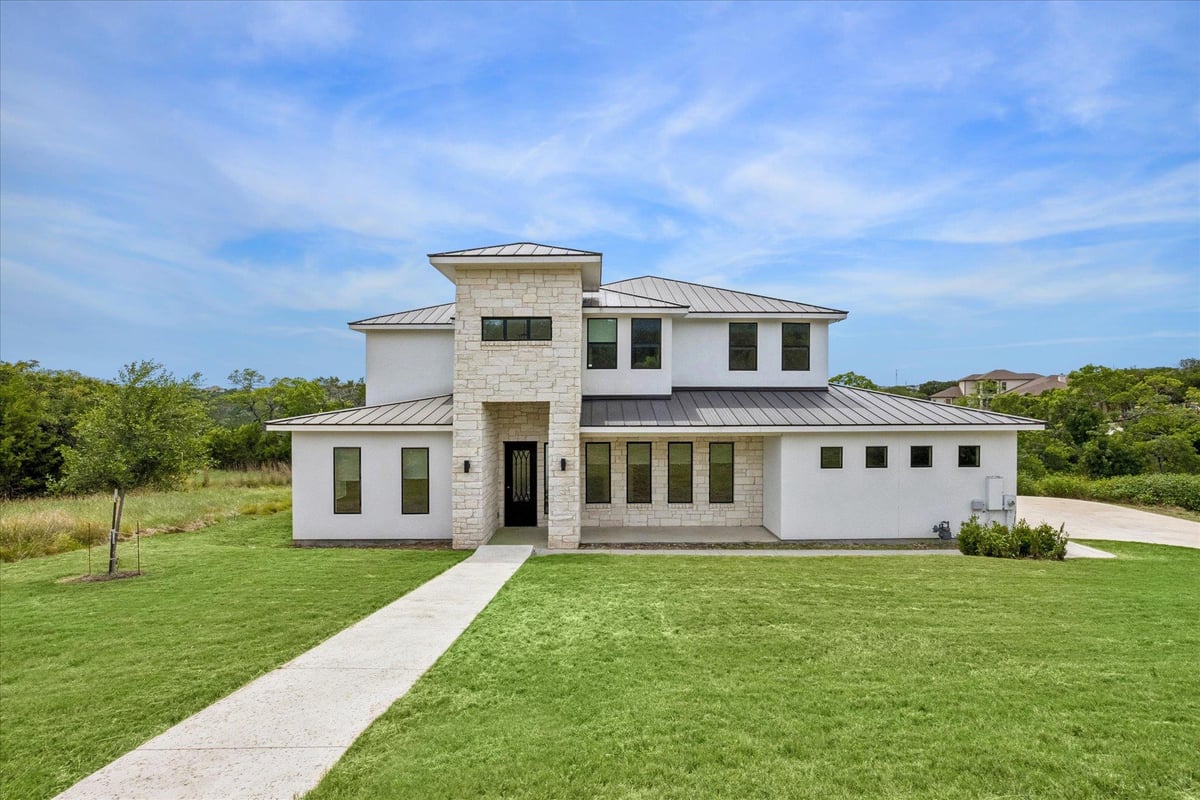 View 7224 Getaway DR in The Bluffs at the Hollows 7224 Getaway DR - front exterior - Luxury home in The Bluffs at the Hollows, Jonestown, TX
