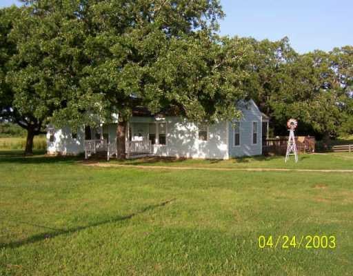View 729 Knobbs Rd 729 Knobbs Rd - front exterior - Luxury home in McDade, TX