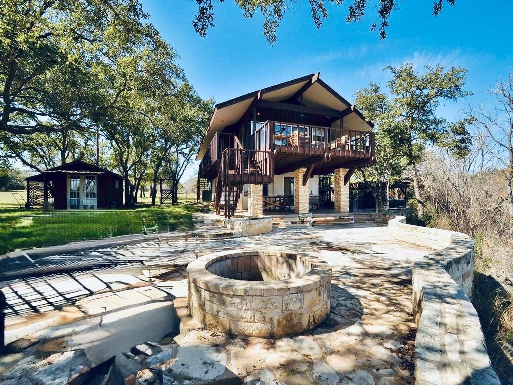 View 729 Nomad Dr in Paleface Lake Country Estates 729 Nomad Dr - front exterior - Luxury home in Paleface Lake Country Estates, Spicewood, TX