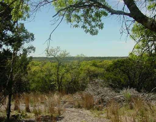 View 7299 Mount Sharp 7299 Mount Sharp - front exterior - Luxury lot in Wimberley, TX