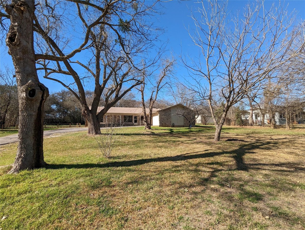 View 7310 Forest Wood RD in Elmwood Estates 7310 Forest Wood RD - property photo 1 - Luxury home in Elmwood Estates, Austin, TX