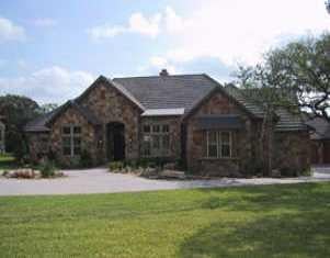 View 7416 Oak Shores DR in Greenshores on Lake Austin 7416 Oak Shores DR - front exterior - Luxury home in Greenshores on Lake Austin, Austin, TX
